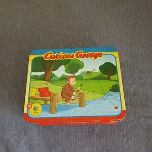 Curious George  Jizsaw puzzle 24 pieces in metal Tin Used